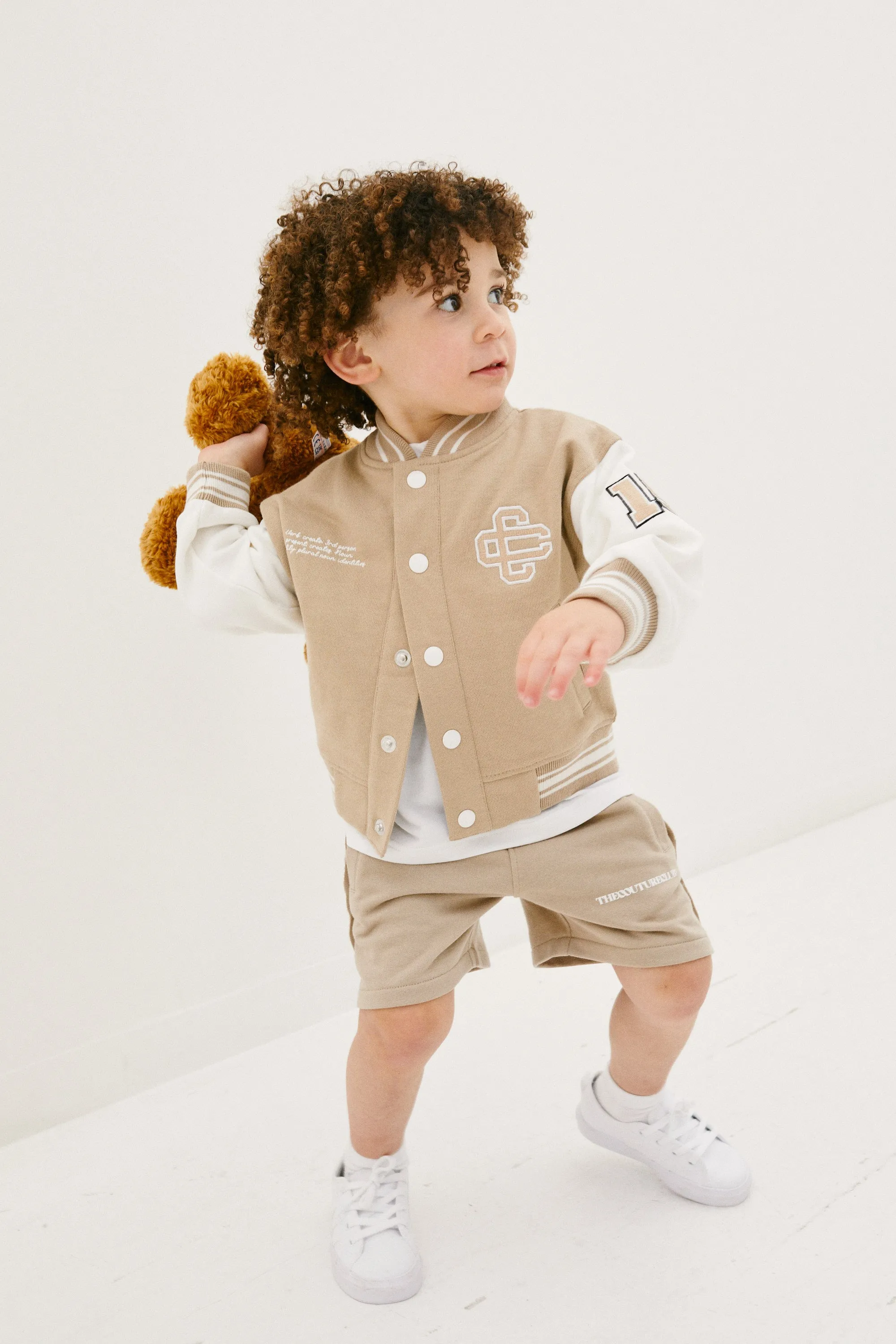 KIDS EMBLEM VARSITY BOMBER JACKET - BEIGE