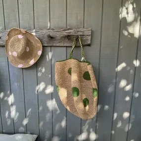 Raffia basket with green dots